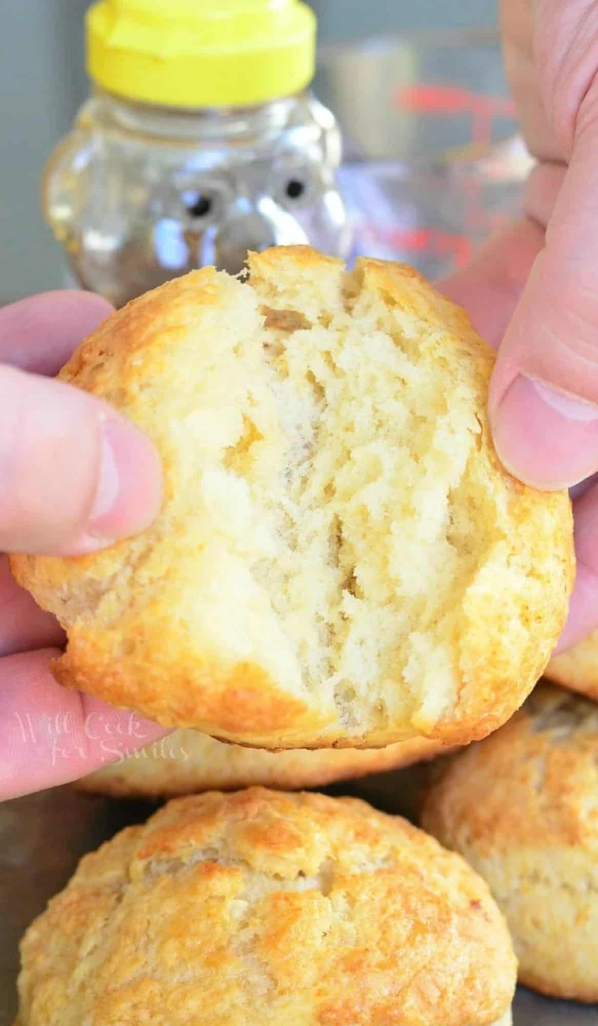 honey butter biscuits being broke in half.