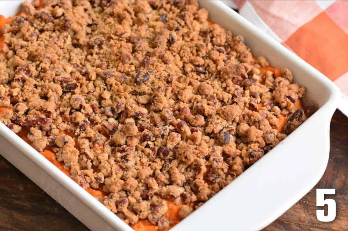 sweet potato casserole with pecan crumble topping baked.