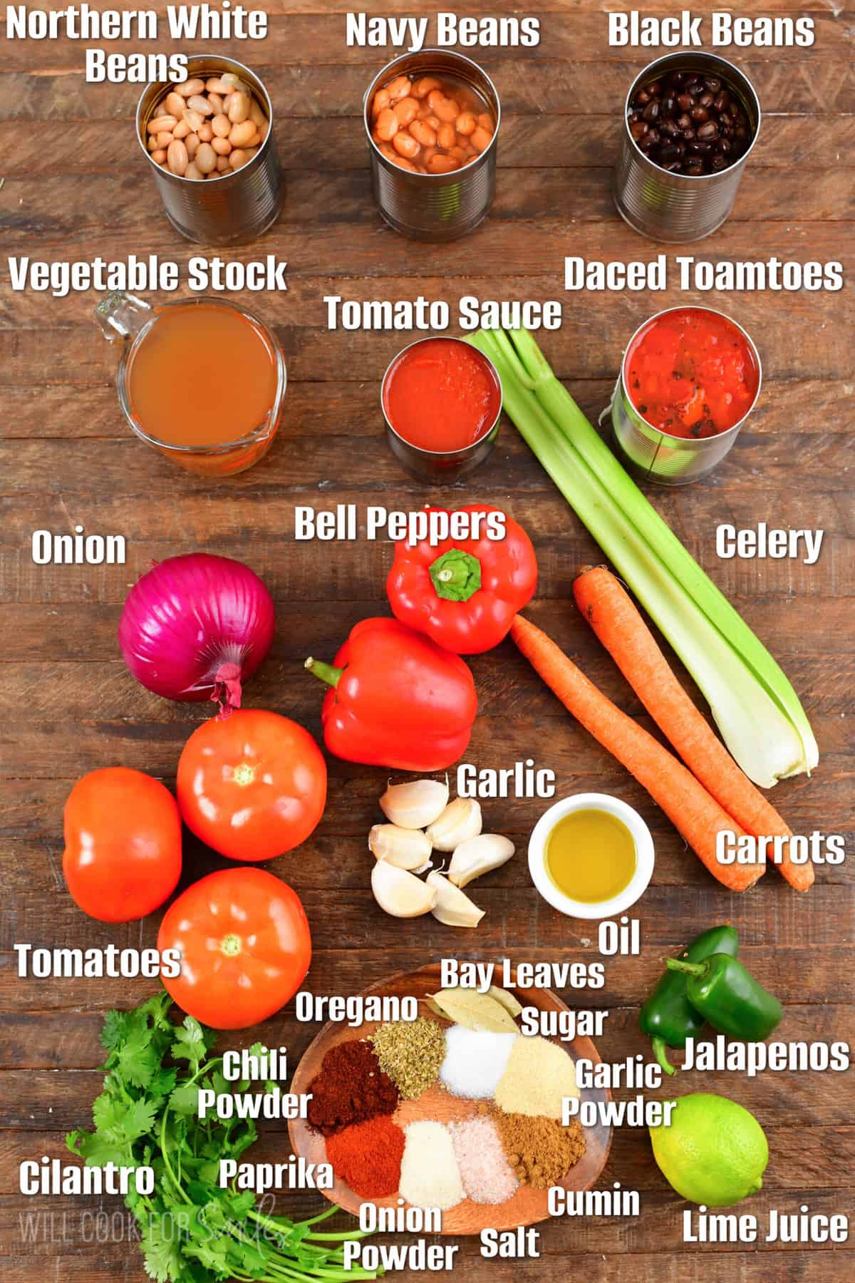 labeled ingredients for vegetarian chili on a a wood surface.