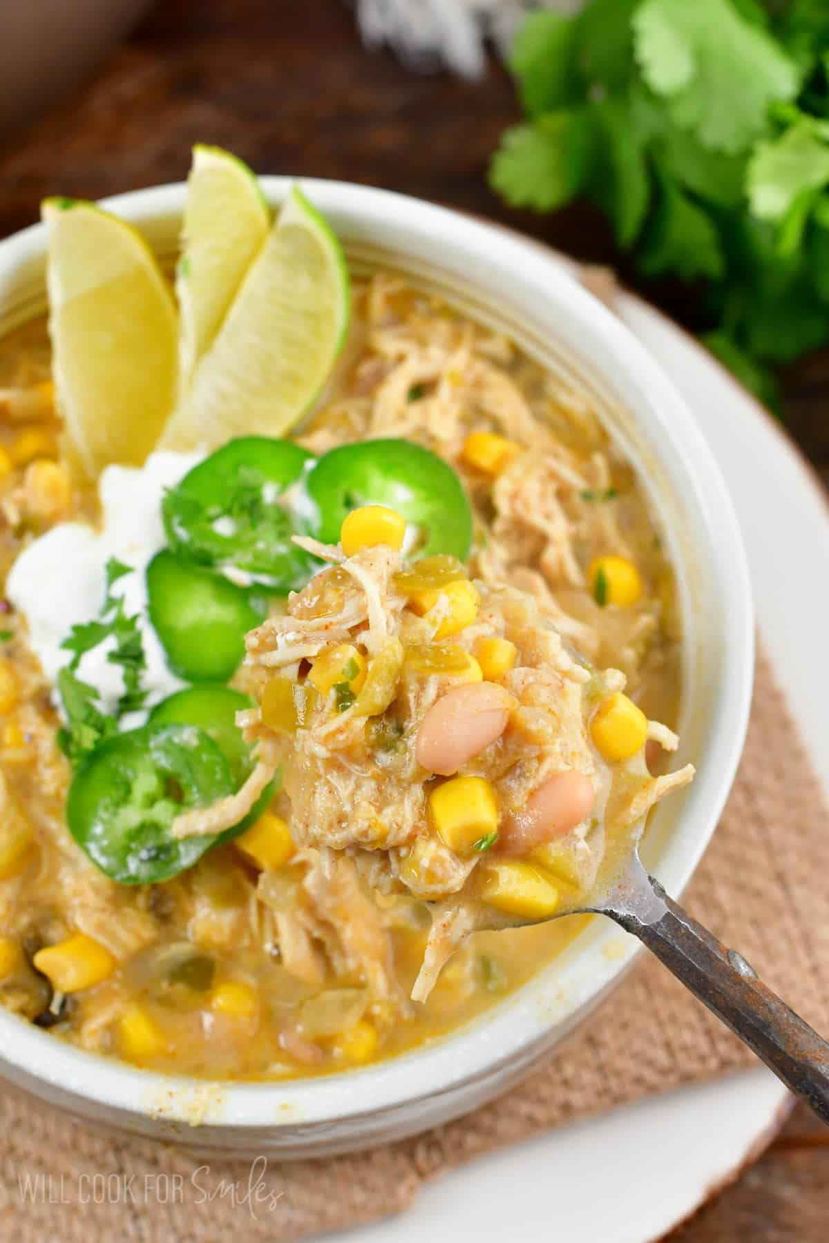 white chicken chili on a spoon