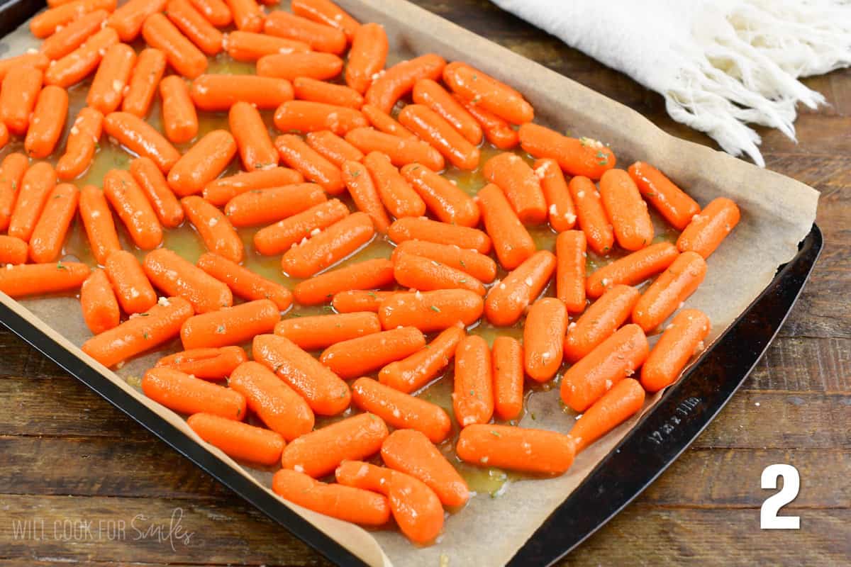 spread carrots with honey vinegar mixture in a baking sheet.
