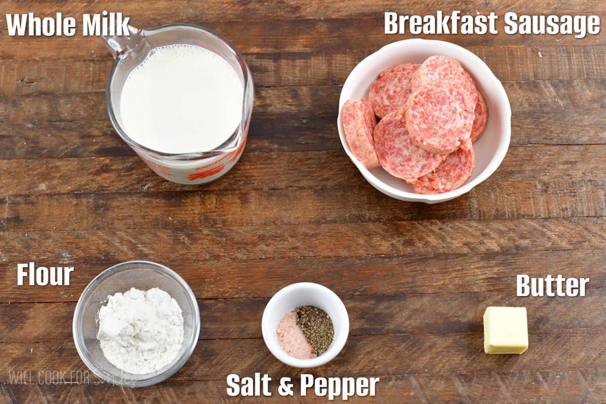 labeled ingredients for biscuits and gravy on a wood surface.