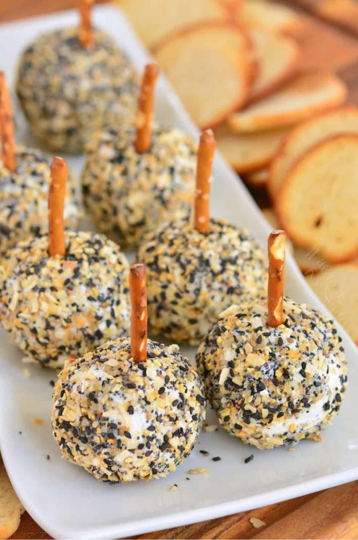 several everything bagel seasoning coated mini cheese balls.