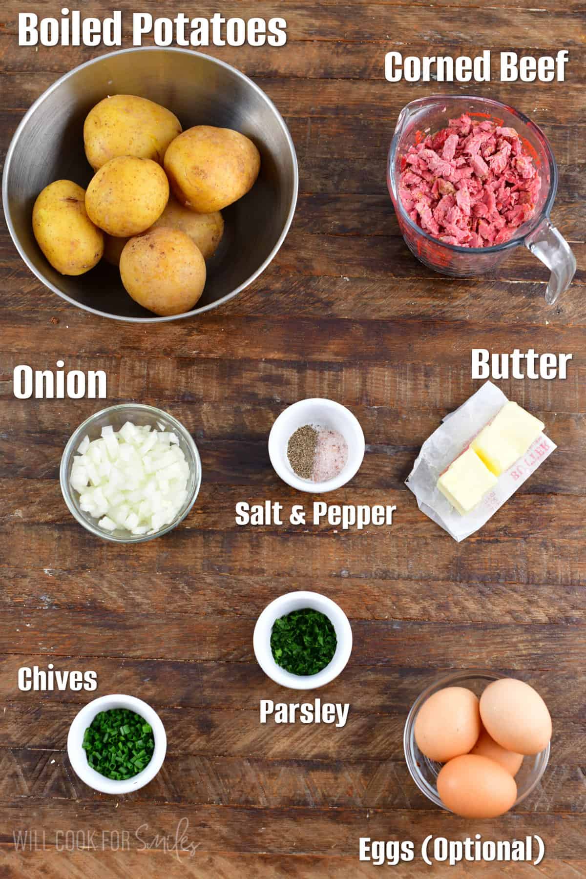 Labeled Corned beef hash ingredients on a wood surface.