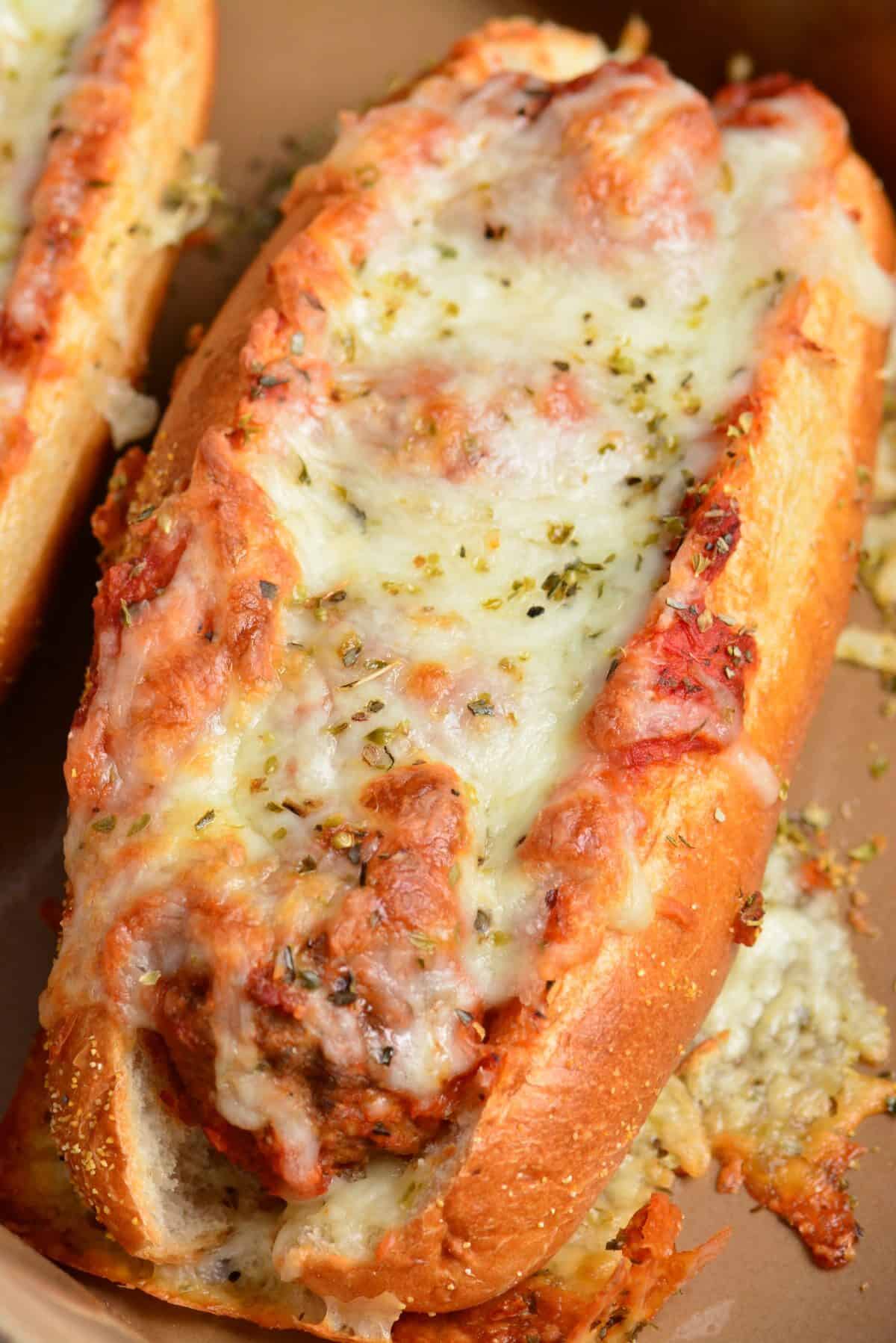 one meatballs sub in a baking dish.