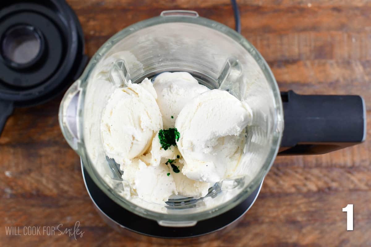 Ice cream and green food coloring in a blender.