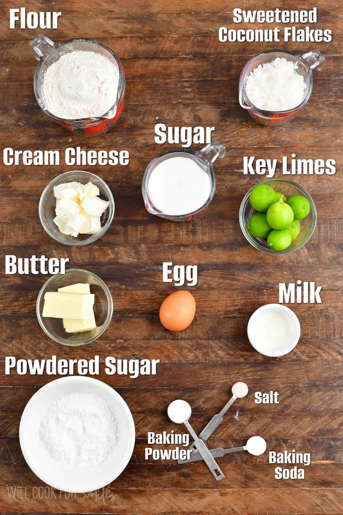 Labeled coconut Key lime Cream Cheese Cookie ingredients on a wood surface.