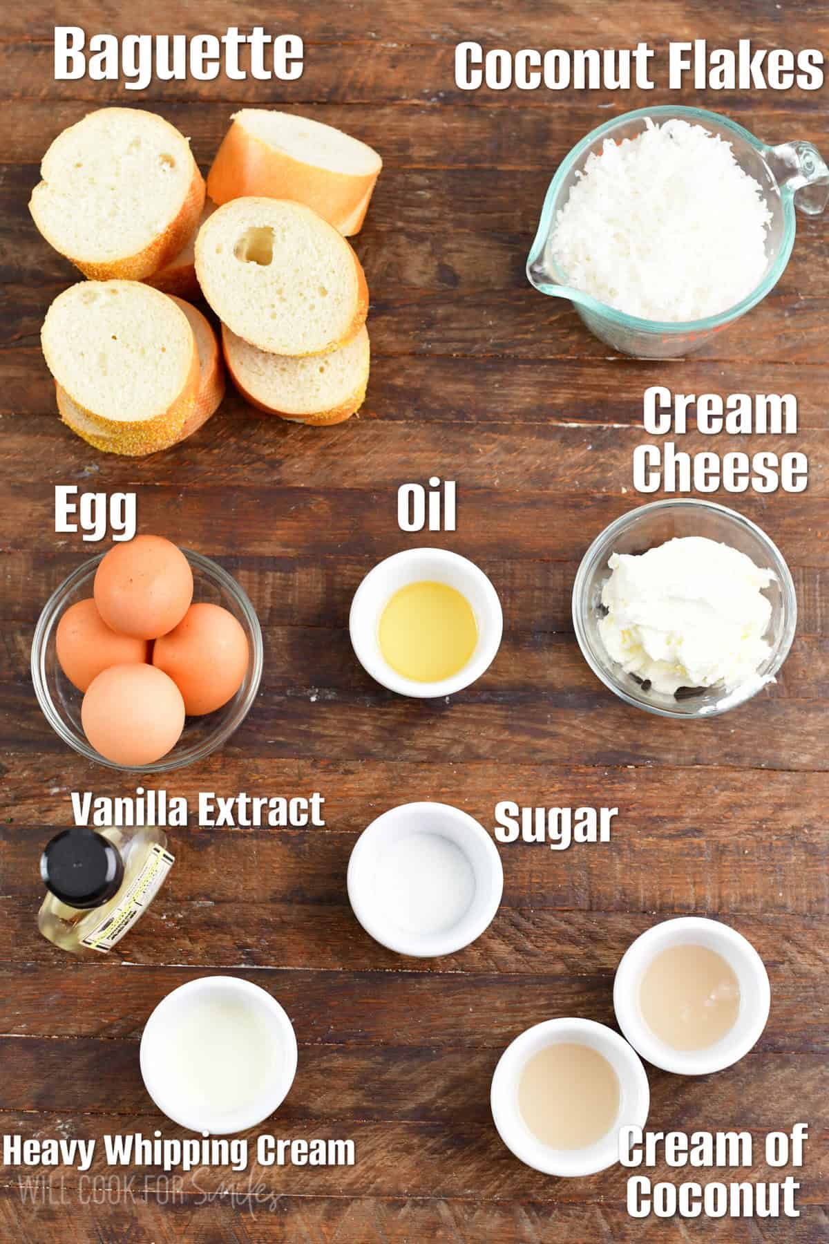 labeled ingredients to make coconut stuffed French toast on wooden background.