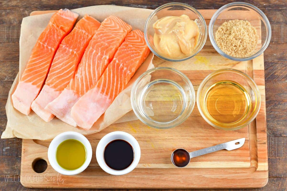 ingredients to make miso salmon laid out on a cutting board.
