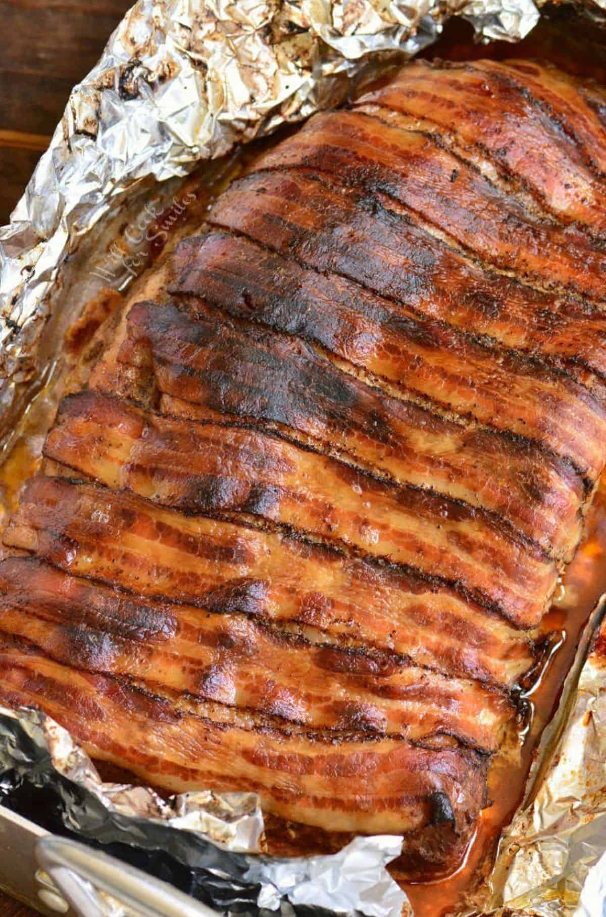cooked bacon wrapped whole been brisket in the roasting pan in foil.