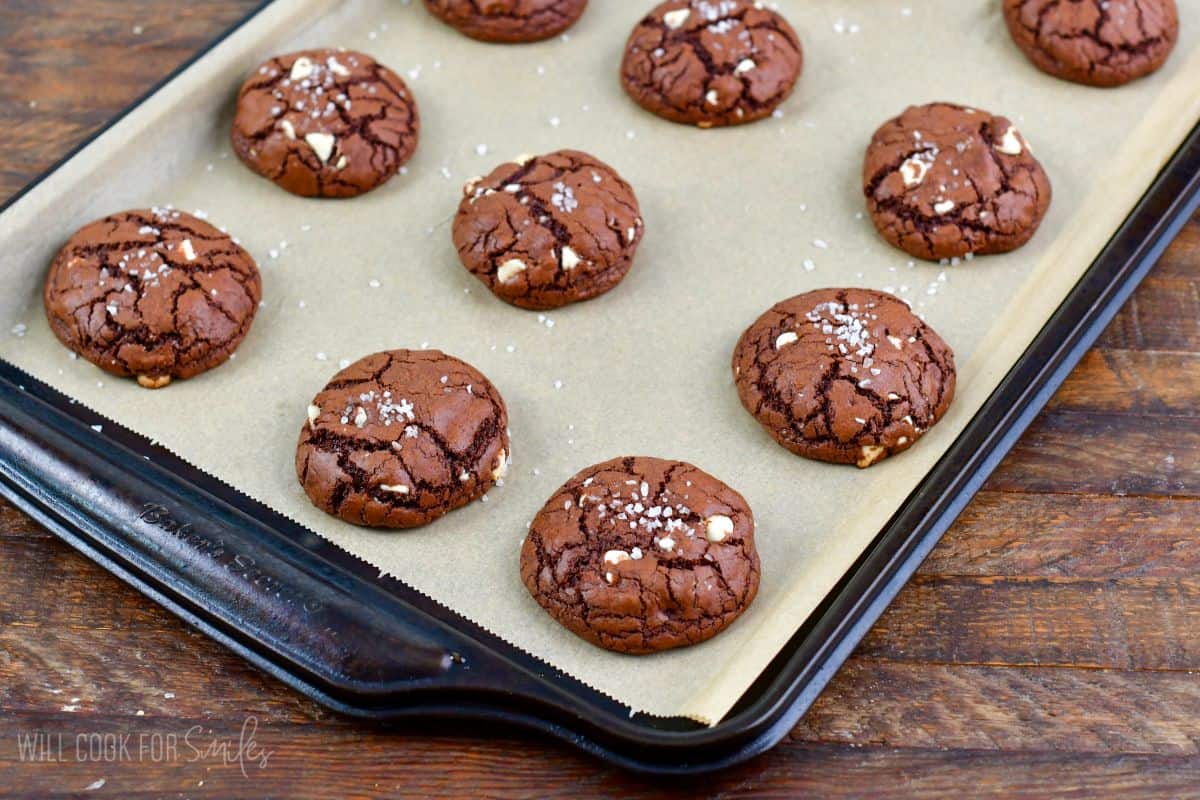 baked crinkled soft and chewy chocolate brown butter cookies topped with some salt.