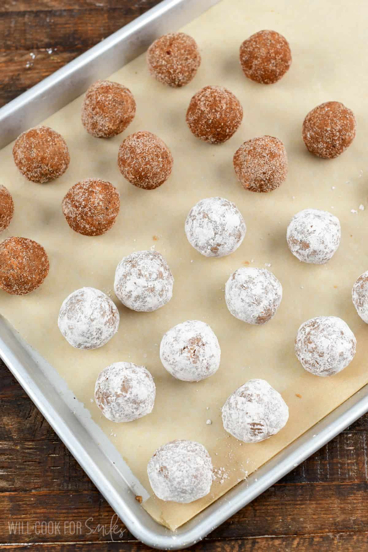 Rumchata rum balls rolled and put on a parchment lined baking sheet.