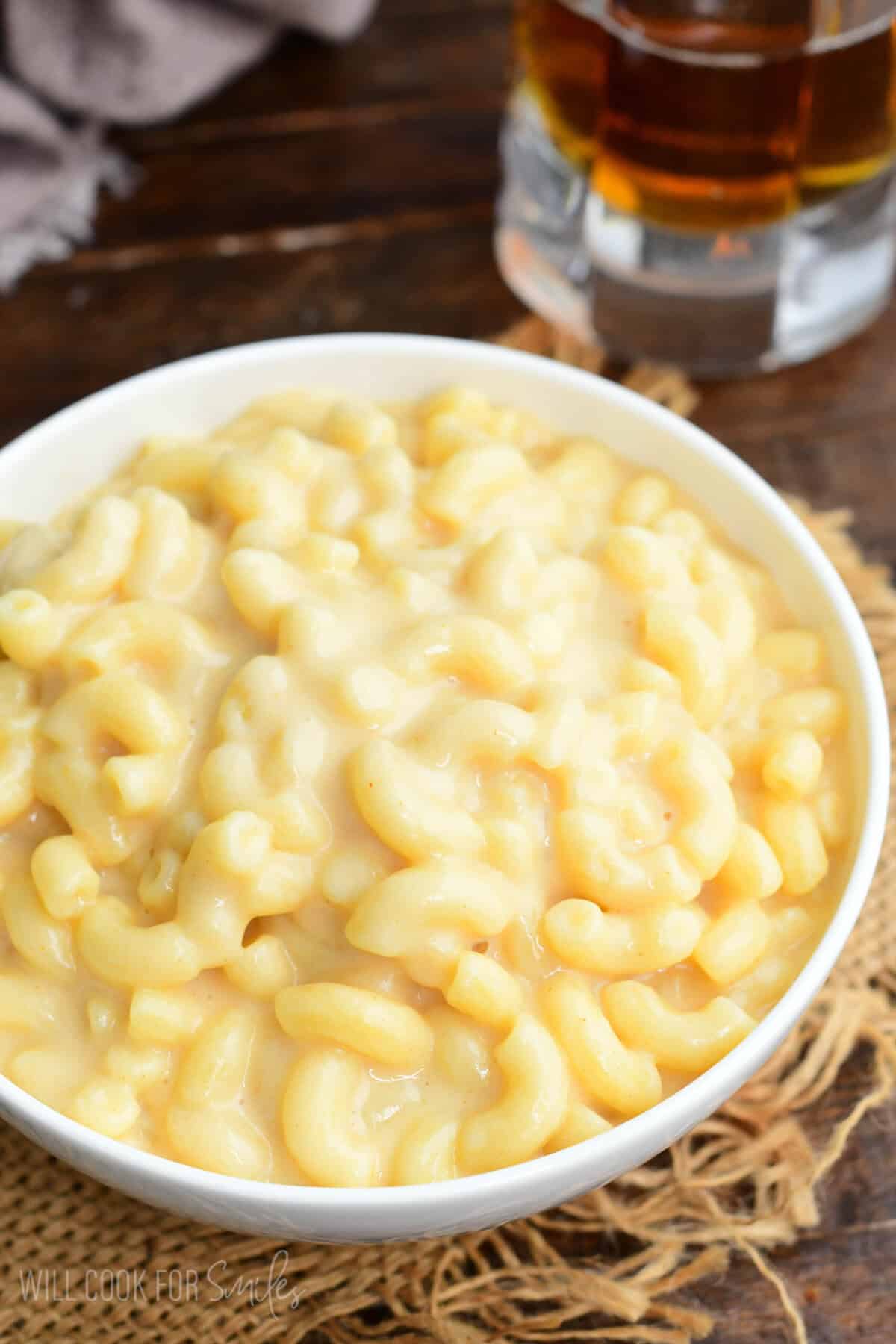 Creamy stovetop beer macaroni and cheese served in a bowl with elbow pasta coated in smooth melted beer cheese sauce.