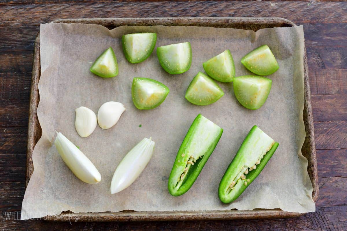 chopped vegetables of the baking sheet before roasting.