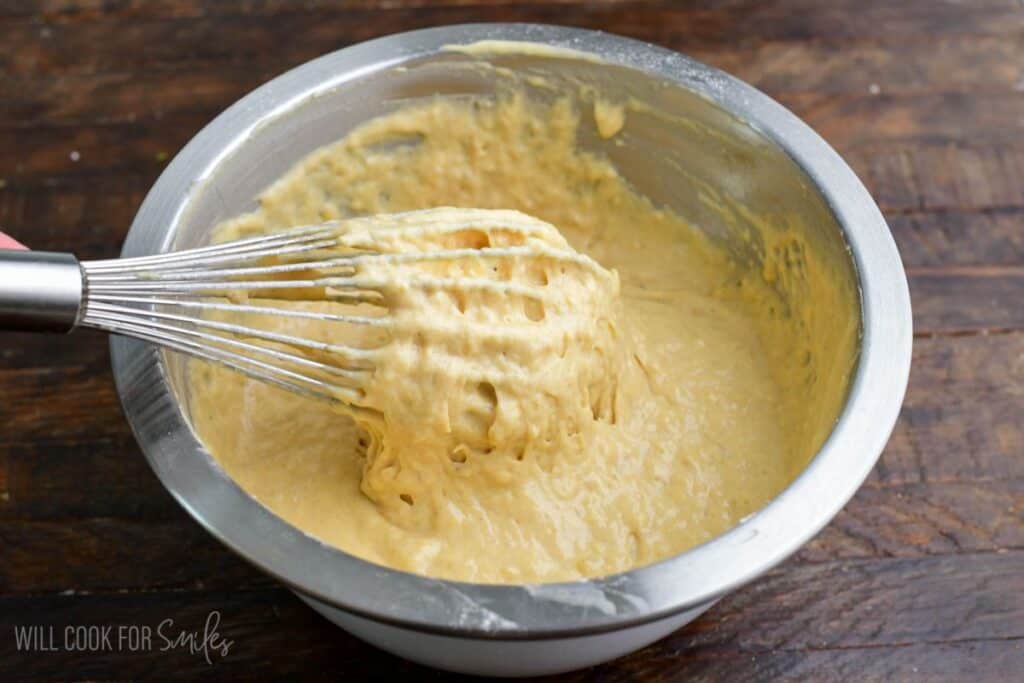 Banana buttermilk pancake batter whisked until smooth and thick, ready to cook on the griddle.