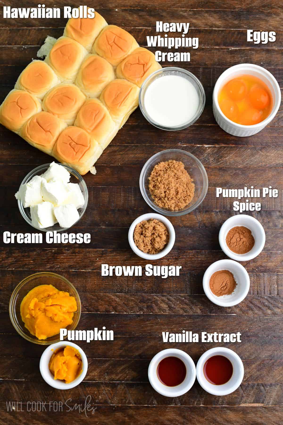 labeled ingredients Pumpkin Cheesecake Stuffed Hawaiian French Toast on a wood surface.
