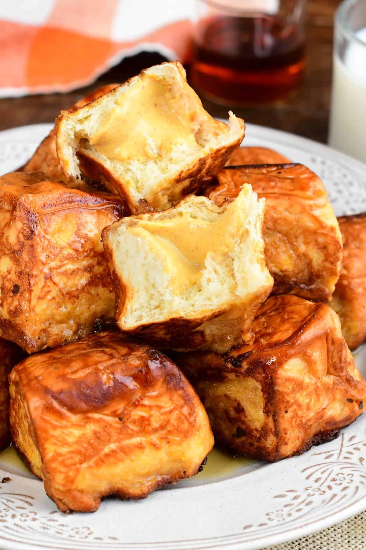Pumpkin cheesecake stuffed Hawaiian French toast bites with a creamy pumpkin cheesecake center.